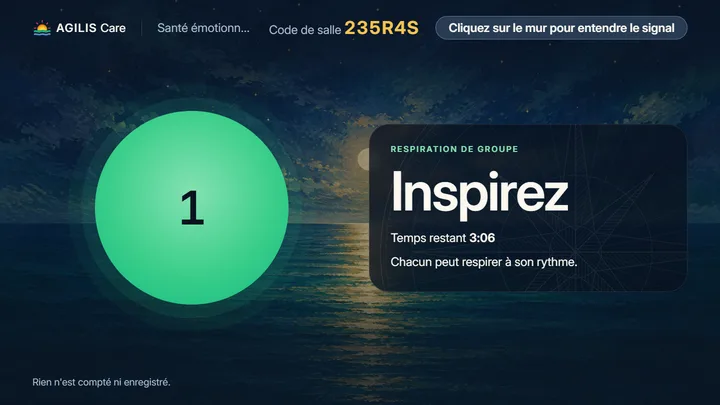 La respiration de groupe projetée : la même bulle au mur et dans chaque main, calée sur l'horloge de la base pour que tout le monde inspire ensemble.